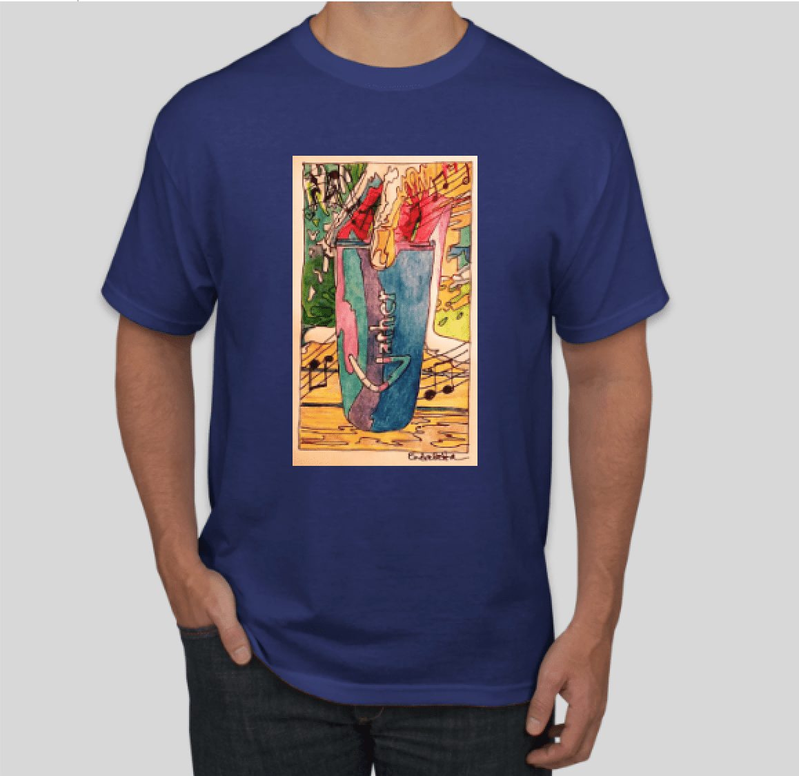 A royal blue t-shirt featuring a rectangular graphic print with vibrant, abstract artwork that includes a figure and various colorful elements.
